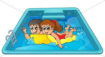 Children on floating mattress in pool