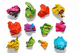 Crumpled color paper folded in a row