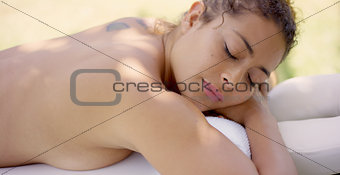 Top down view of woman on massage table