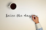 cup of coffee and text seize the day