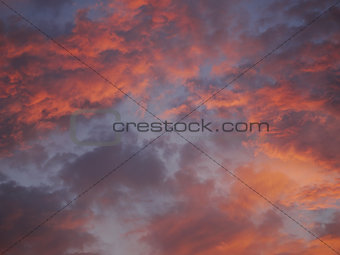 Dramatic purple sky and red gray cloudy at sunset