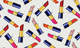 Beautiful seamless pattern of multi-colored lipsticks
