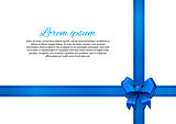 White post card with blue bow and ribbon