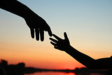 silhouette parent and child hands
