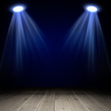 Spotlights on wooden floor in empty room