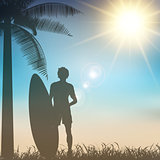 Surfer on a tropical background