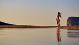 woman walking on the beach
