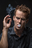 Portrait of man with cigarette