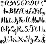 Handwritten alphabet written with brush pen.