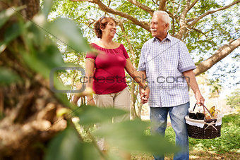 Old Man Woman Senior Couple Walking With Picnic Basket