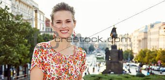 Portrait of smiling woman standing near National Museum, Prague