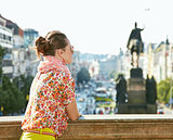 Woman looking into the distance at Wenceslas Square in Prague