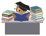 Owl in mortarboard reading book