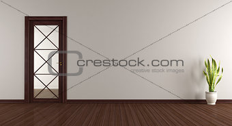 Empty room with wooden glass door