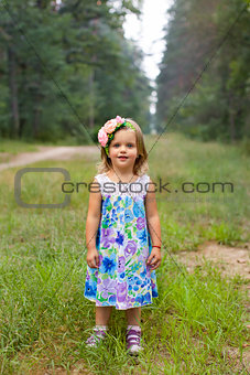 Portrait of a young girl on the nature