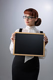 Woman with small blackboard