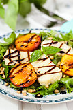 Salad with grilled halloumi cheese and peaches