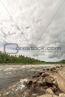 River with Forest and Cloudy Sky
