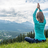 Woman Meditate at the Mountains