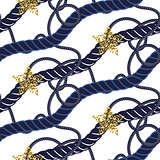 Marine navy blue rope knot seamless pattern with gold star.