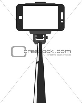 Selfie stick and smartphone with blank screen