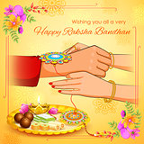 Brother and Sister tying rakhi on Raksha Bandhan
