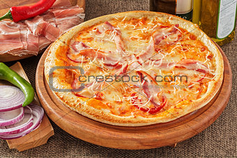 Pizza with bacon and pepper
