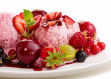 Two ball strawberry ice with fruits.