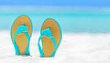 Flip Flops with hearts on a sandy beach