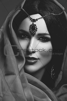 Beautiful girl with arabic makeup