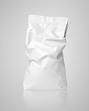 Crumpled blank paper bag package with creases on gray
