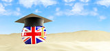 English language on holiday, graduation cap at the beach