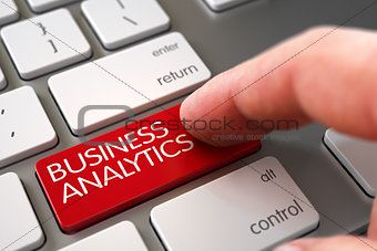 Hand Touching Business Analytics Button.
