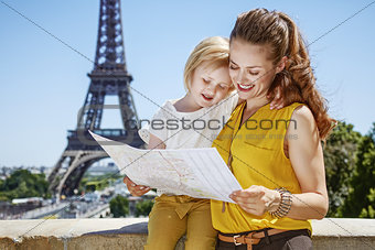 mother and daughter exploring attractions in Paris, France