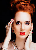 beauty stylish redhead woman with hairstyle and manicure wearing
