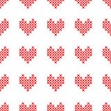 Seamless pattern with cross-stitch hearts on white