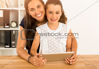 Mother and daughter at home