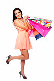 Beautiful happy woman with shopping bags