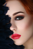 Beautiful girl with smoky eyes and red lips