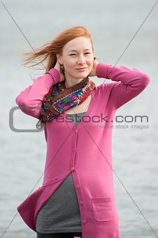 Outdoor portrait of a beautiful redhead woman