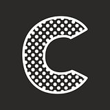 C vector alphabet letter with white polka dots on black background