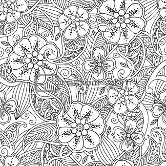 Seamless pattern with flowers and leafs in doodle mendie style.