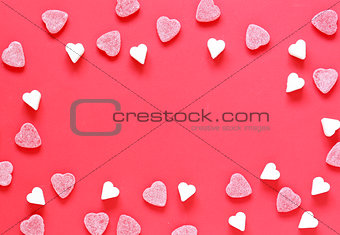 Festive red background and sweet sugar hearts, valentines day