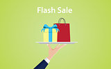 flash sale illustration with hand give a plate with shopping bag and gift box