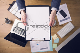 Businessman holding a clipboard