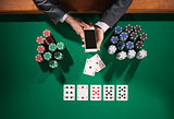 Poker player with smartphone