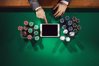 Poker player with digital tablet