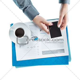 Business woman using a smart phone