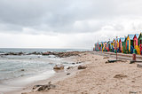 Multi-coloured beach huts at St. James beach