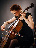 Cello player concentrating on her playing
